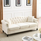 Canapé Chesterfield 3 places capitonné beige/gris avec accoudoirs roulés et cloutage décoratif