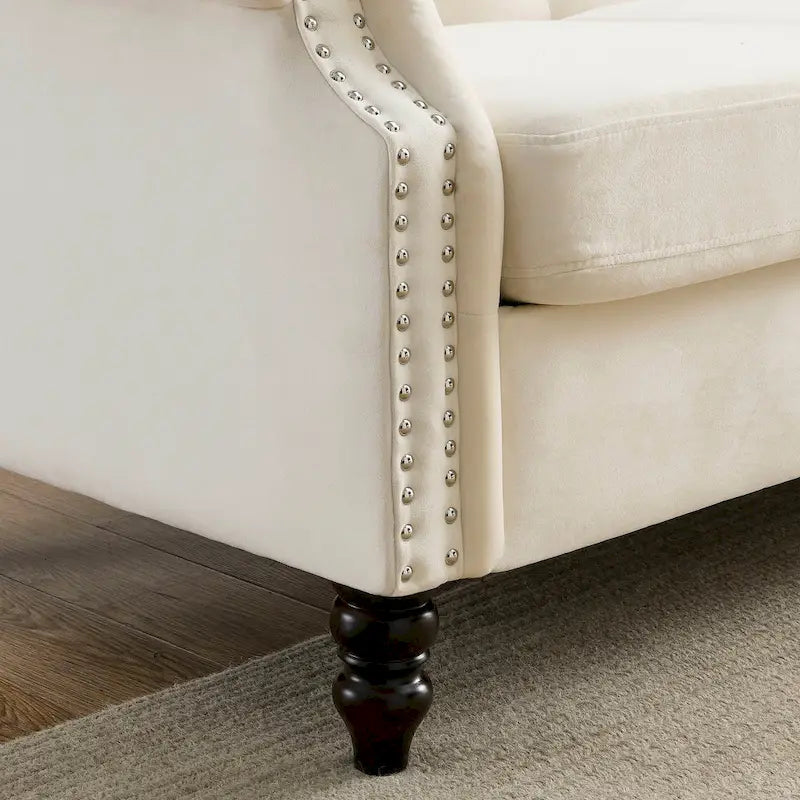 Canapé Chesterfield 3 places capitonné beige/gris avec accoudoirs roulés et cloutage décoratif
