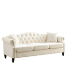 Canapé Chesterfield 3 places capitonné beige/gris avec accoudoirs roulés et cloutage décoratif