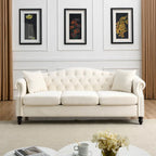 Canapé Chesterfield 3 places capitonné beige/gris avec accoudoirs roulés et cloutage décoratif